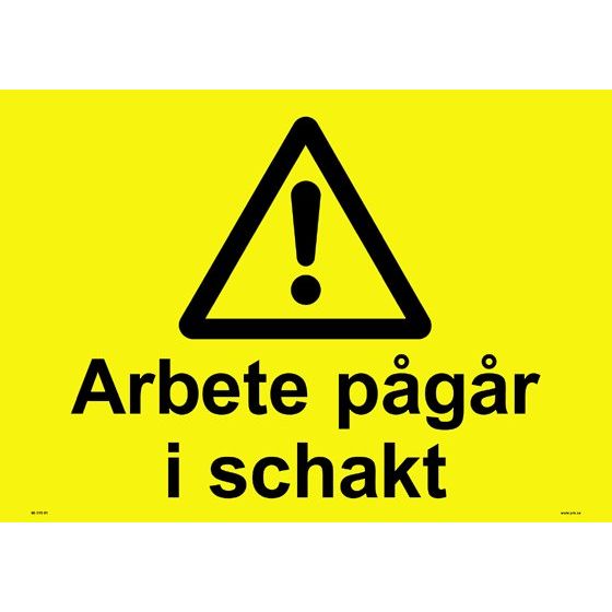 Varningsskylt. Arbete pågår i schakt
